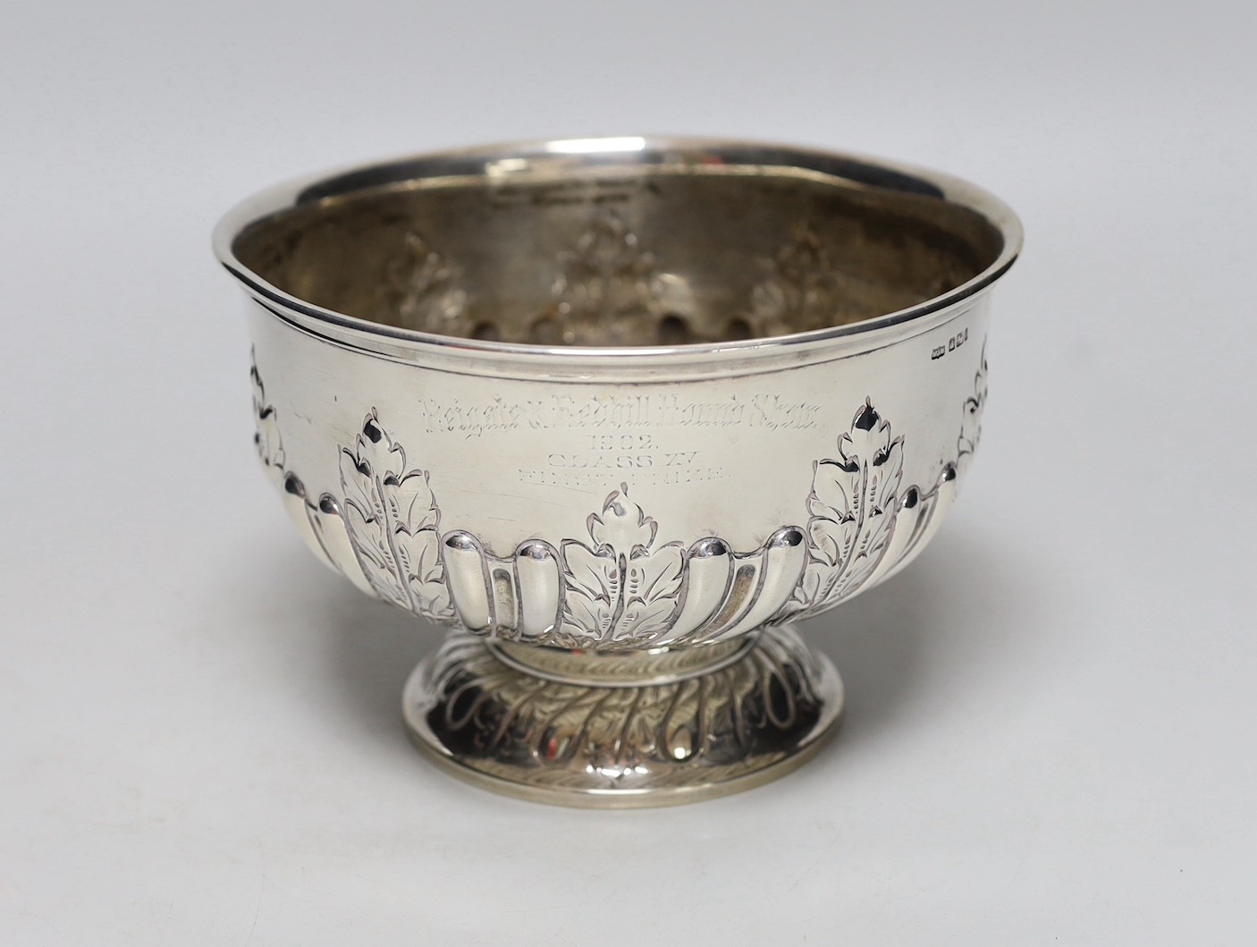 An Edwardian demi fluted silver presentation pedestal rose bowl, with engraved inscription, Mappin & Webb, Sheffield, 1901, diameter 18cm, 14.5oz.